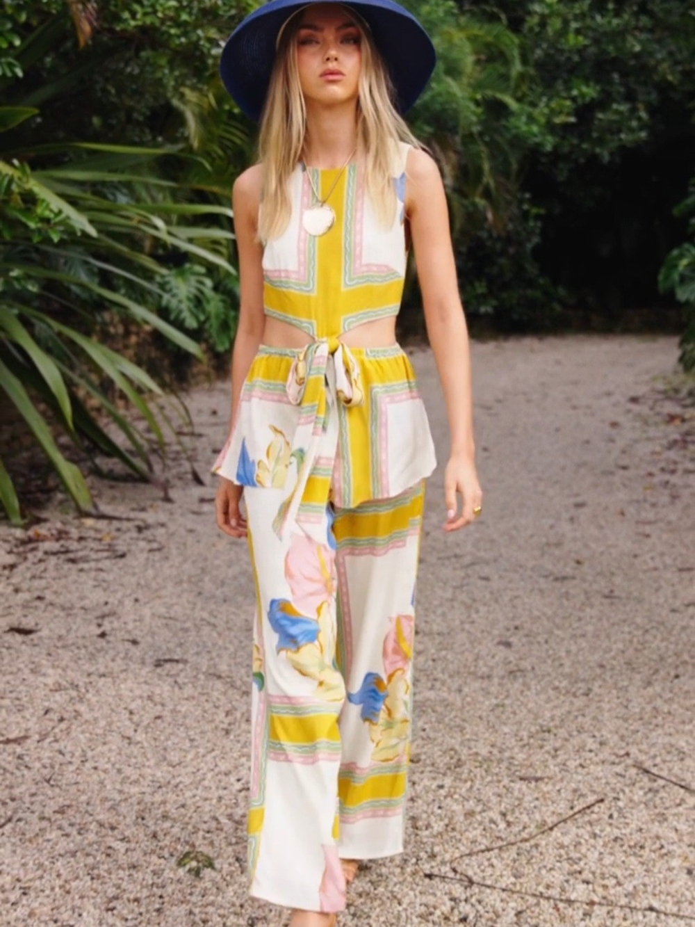 Sleeveless Pip Cutout Floral Tie-Waist Jumpsuit in Yellow and Cream